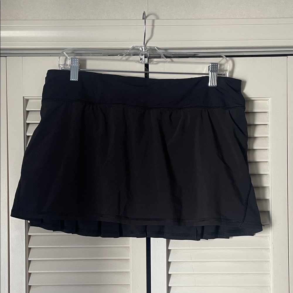 Lululemon Black Athletic tennis Skort flat front pleated back Sz 10 12” long